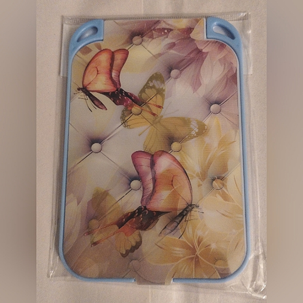 Picture changing butterfly mirror